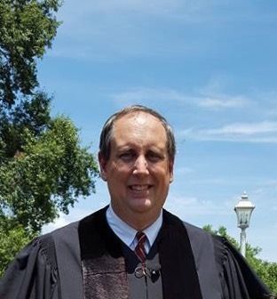 Kyle E. Sims